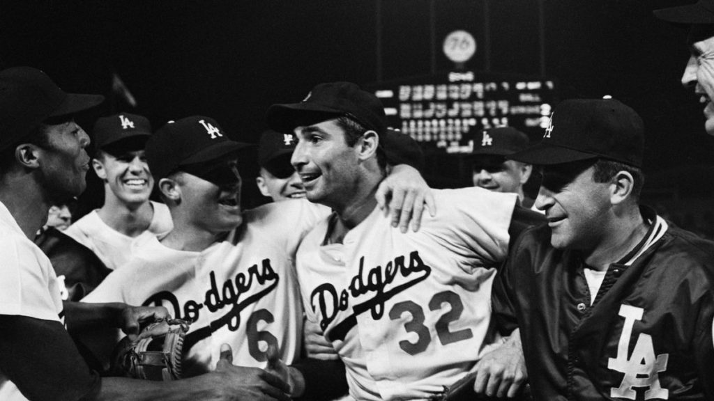 Sandy Koufax dazzled under the lights, throwing a perfect game against the Chicago Cubs. It marked the first perfect game in history to be pitched at night.